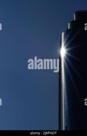 Beautiful modern office building against the blue sky Stock Photo - Alamy