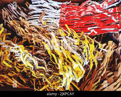 A close up to a colorful shredded cardboard Stock Photo