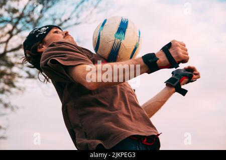A closeup of a man playing soccer Stock Photo