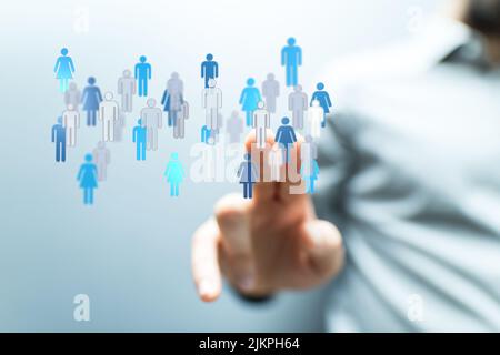 Social media icons floating from man using computer Stock Photo - Alamy