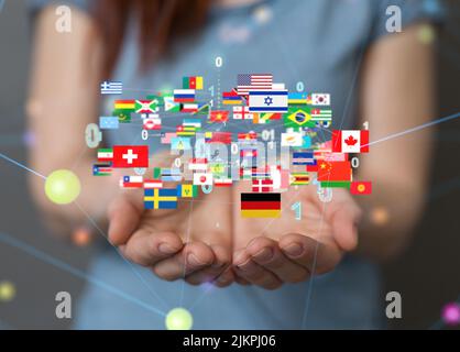 A 3d rendering of international flags and connections for global communication floating above hands Stock Photo