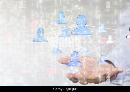 A 3D rendering of a group of floating people icons on a businessman's hand Stock Photo