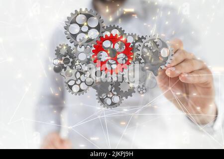 A male touching 3d gear icons on virtual screen Business, Internet and technology concept. Stock Photo