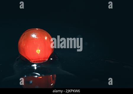 A water bead on a blurred background Stock Photo