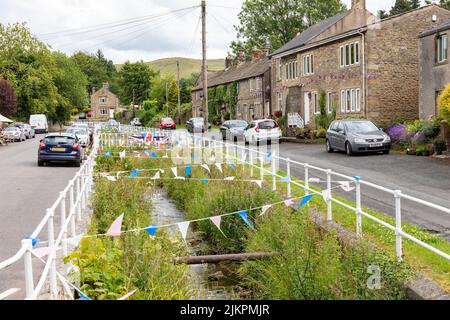 Pendleton Clitheroe, Lancashire, village celebrates Queen Elizabeth platinum with bunting and British Union Jack flags in the village,England,2022 Stock Photo