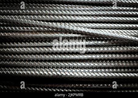 Close-up stacked wire steel rebar material, rebar for industrial and construction work, texture and background Stock Photo
