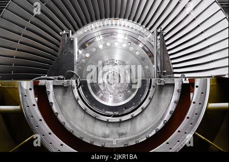 A powerful steam turbine rotor is installed in the lodgment of the steam turbine base. Stock Photo