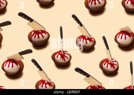 Seamless pattern of Halloween treat desserts decorated knifes. Happy Halloween concept Stock Photo