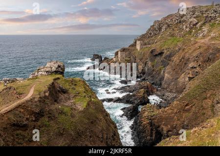 ruins of the crown mines on the cliffs at botallack cornwall at dusk Stock Photo