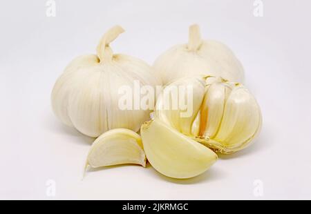 Heap of a Garlic Bulbs and Cloves Isolated on White Background Stock Photo