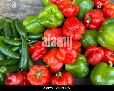 Bright red and green Florida peppers at a fruit and vegetable stand in Orlando, Florida. Stock Photo