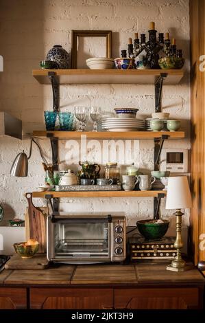 modern kitchen japandi style, kitchen shelves in natural wood, oak Stock Photo