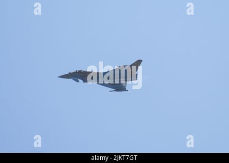 RAF eurofighter Typhoon military fighter jet flying at NATO days airshow in Ostrava, Czech Republic. Jet performing manoeuvres with full afterburner. Stock Photo