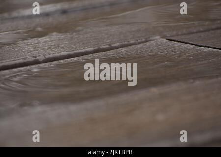 A closeup of wooden texture floorboards in brown color Stock Photo