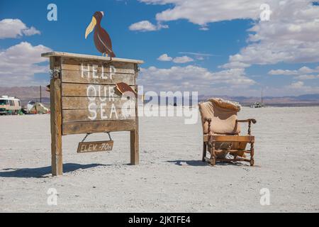 Renegade artists have created odd installations along the dry lakeshore of the Salton Sea in Bombay Beach. Stock Photo