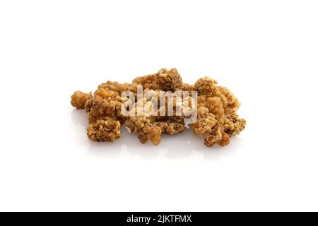 Dried red mulberry fruits on white isolated Stock Photo