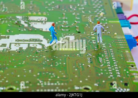 jogger running on an electronic circuit board,concept: circuit of health Stock Photo