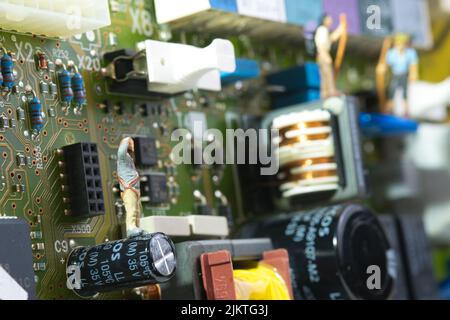 a hiking team on an electronic circuit board, close up Stock Photo