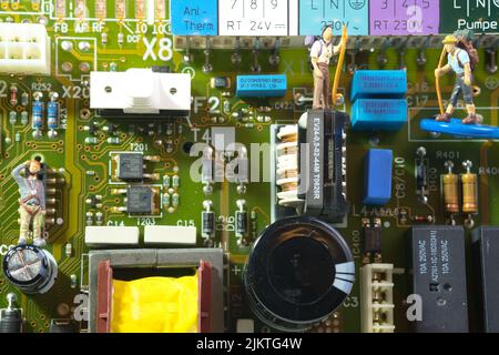 a hiking team on an electronic circuit board, closeup Stock Photo