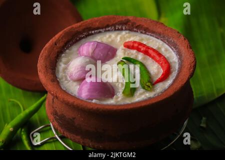 chaddannam indian  famous traditional fermented rice with curd rice,curd rice with onions and chillies in a mud pot closeup with selective focus Stock Photo