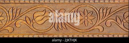 There are traditional old drawings on the doors of the houses Stock Photo