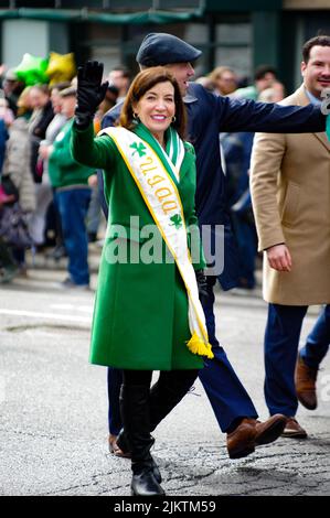 A vertical shot of New York's governor Kathy Hochul smiling and waving to people at St. Patricks Day parade Stock Photo