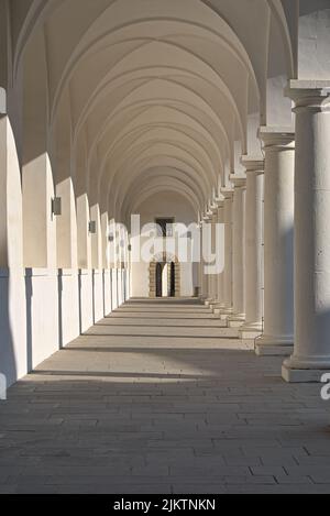 Light shines in renaissance arcades and throws shades Stock Photo - Alamy