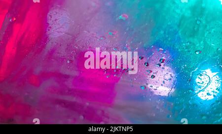A vibrant abstract texture with neon light play in purple and blue Stock Photo