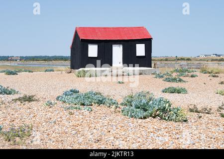 Red Roofed Hut at Rye Harbour Nature Reserve, Rye Harbour, Rye, East Sussex, England, UK Stock Photo