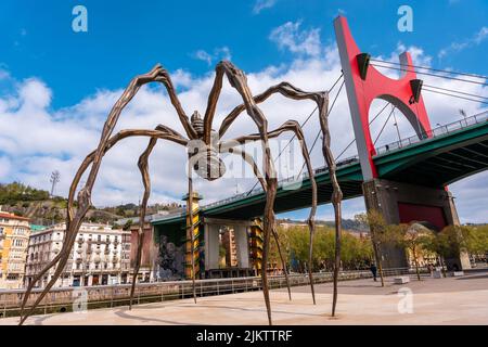 Spider sculpture next to the Guggenheim museum in the city of Bilbao on a spring morning, Vizcaya. Basque Country Stock Photo