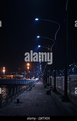 A vertical shot of street lights on a road at night in Baku, Azerbaijan Stock Photo