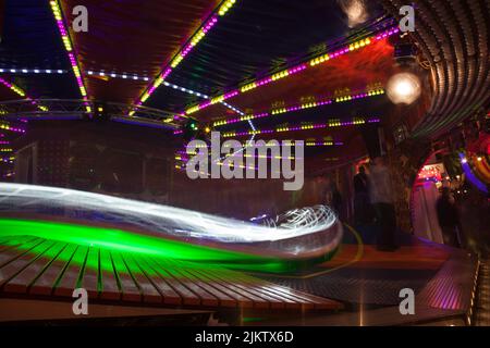 Fairground light traces and images from St Giles Fair, Oxford.  September 2013 Stock Photo