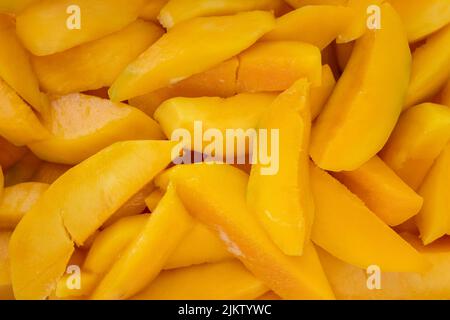 Ripe juicy ingredient mango slices Stock Photo