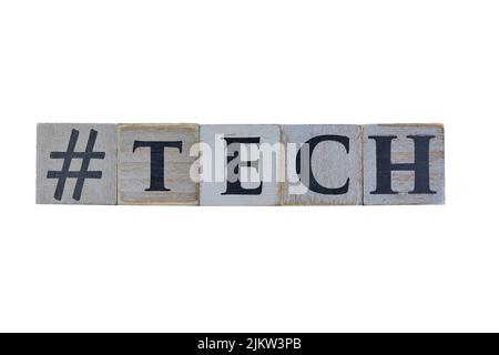 Five isolated, white colored wooden cubes showing a hashtag-symbol and the word Tech on white background, for designs and layouts Stock Photo