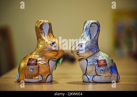 The two Favorina brand chocolate Easter bunnies on a table Stock Photo