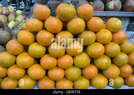 Fresh organic oranges on the market place. Stock Photo
