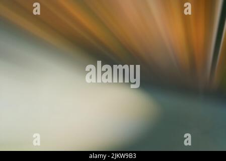 A blurry background of a colorful starburst with sparkles Stock Photo