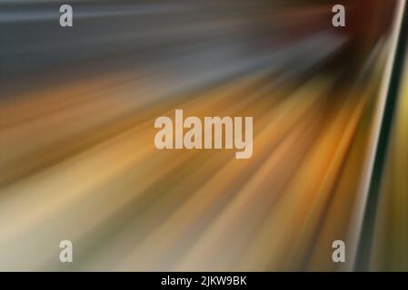 A blurry light effect of starburst in orange tones Stock Photo