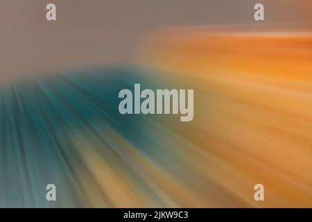 A bright colorful starburst with dynamic rays of light Stock Photo