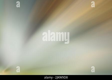 A blurred background of colorful starburst with dynamic sparkles Stock Photo