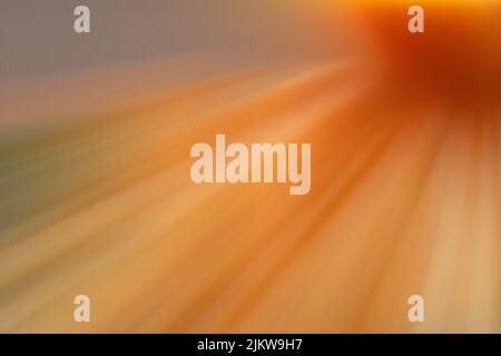 Orange light effect with motion blur. Starburst with sparkles Stock Photo