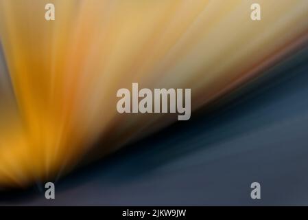 A blurry colorful starburst with spreading sparkles Stock Photo