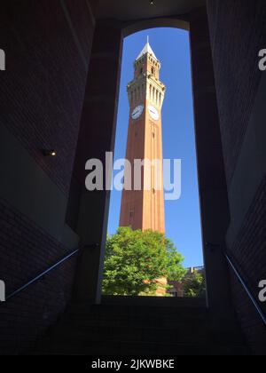 A vertical view of the Joseph Chamberlain Memorial Clock Tower in Birmingham, United Kingdom Stock Photo