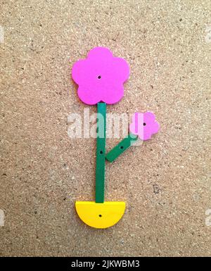 interesting flowers made of wood reminiscent of a small family Stock Photo