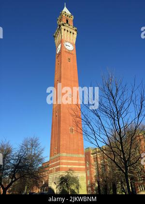 A vertical view of the Joseph Chamberlain Memorial Clock Tower in Birmingham, United Kingdom Stock Photo