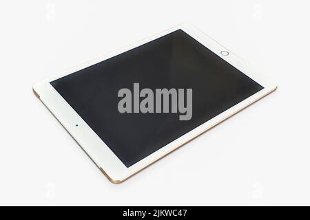 A tablet with a black screen isolated on a white background - copy space Stock Photo