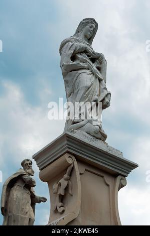 Sculptures near a church of Kamyanets-Podilsky, Ukraine Stock Photo