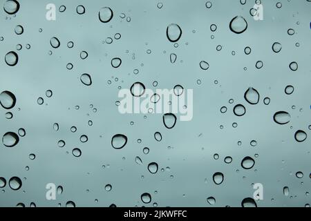 Vibrant waterdrops on a glass window Stock Photo