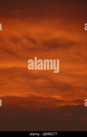 A perfect background of the cloudy sky at sunset Stock Photo
