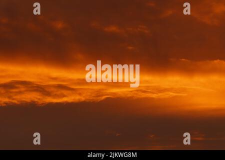 A perfect background of the cloudy sky at sunset Stock Photo